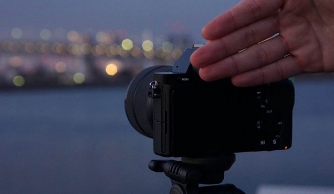 Sony's Touchless Shutter app lets you automatically trigger the camera with a wave of your hand.