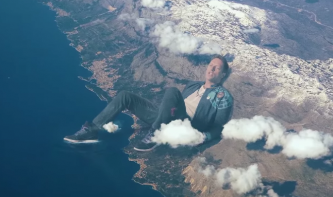 Chris Martin in the music video for Up&Up.