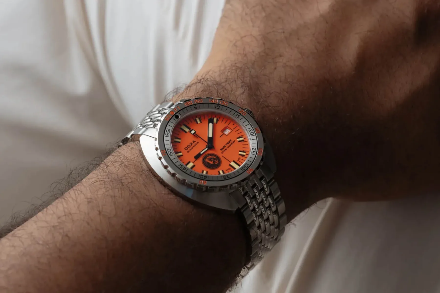 DOXA SUB 750T Clive Cussler: Kako se znebiš 2 milimetrov in postaneš legenda potapljačev