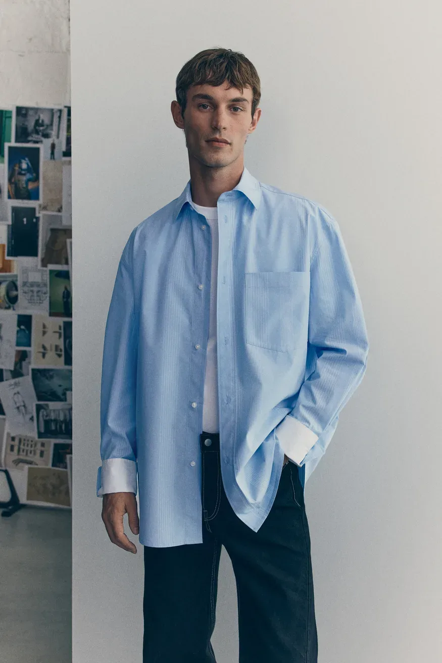 H&M Atelier jesen-zima 2025 razkriva novo moško uniformo: Industrijski šik s pridihom haute couture