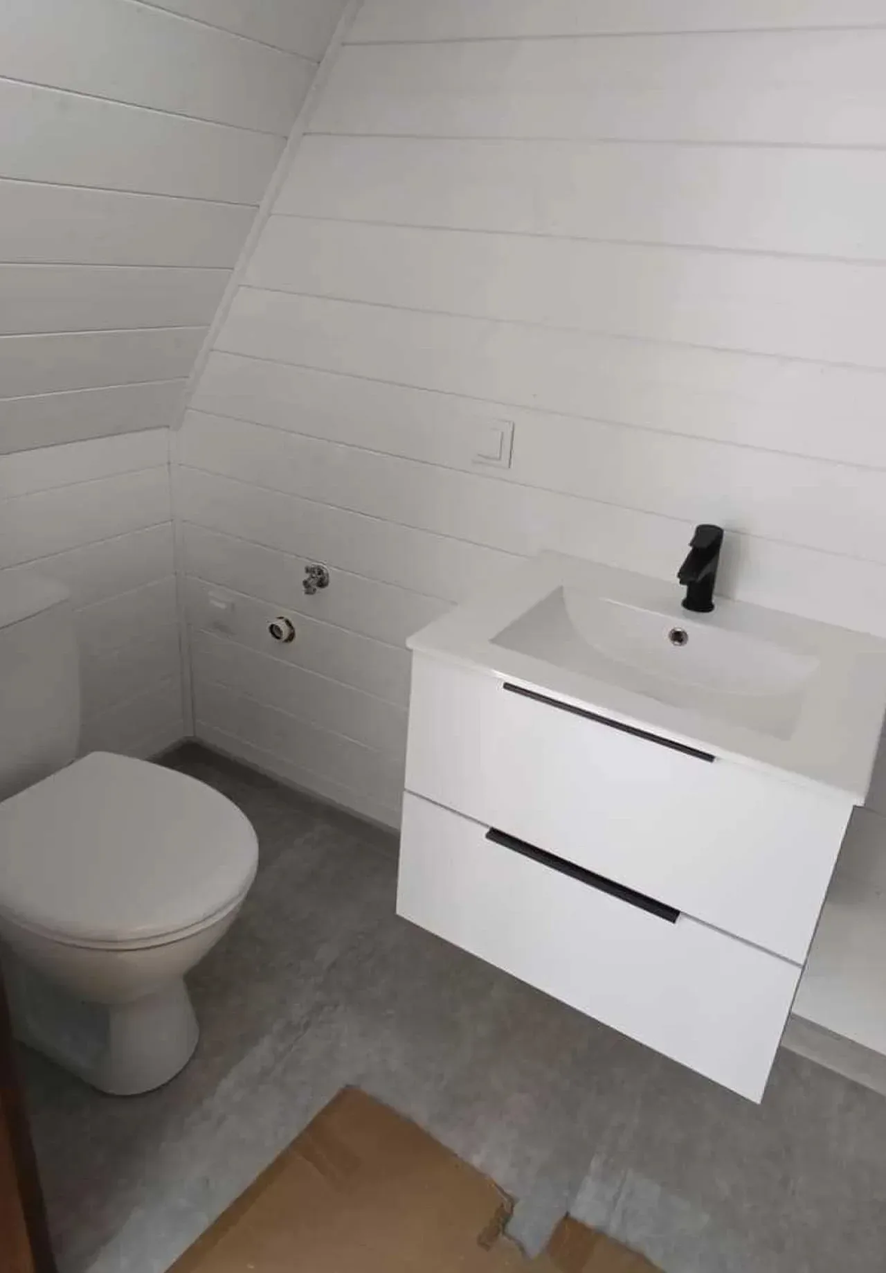 Mini hišica A-oblike, ki dokazuje, da za popoln vikendodklop potrebujete le 14 kvadratnih metrov