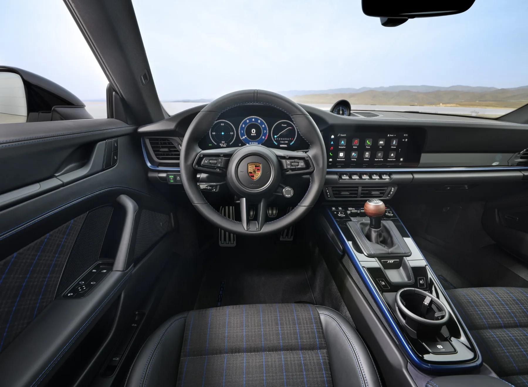 Porsche 911 Carrera T 2025: ikona v kabrioletni in kupe različici