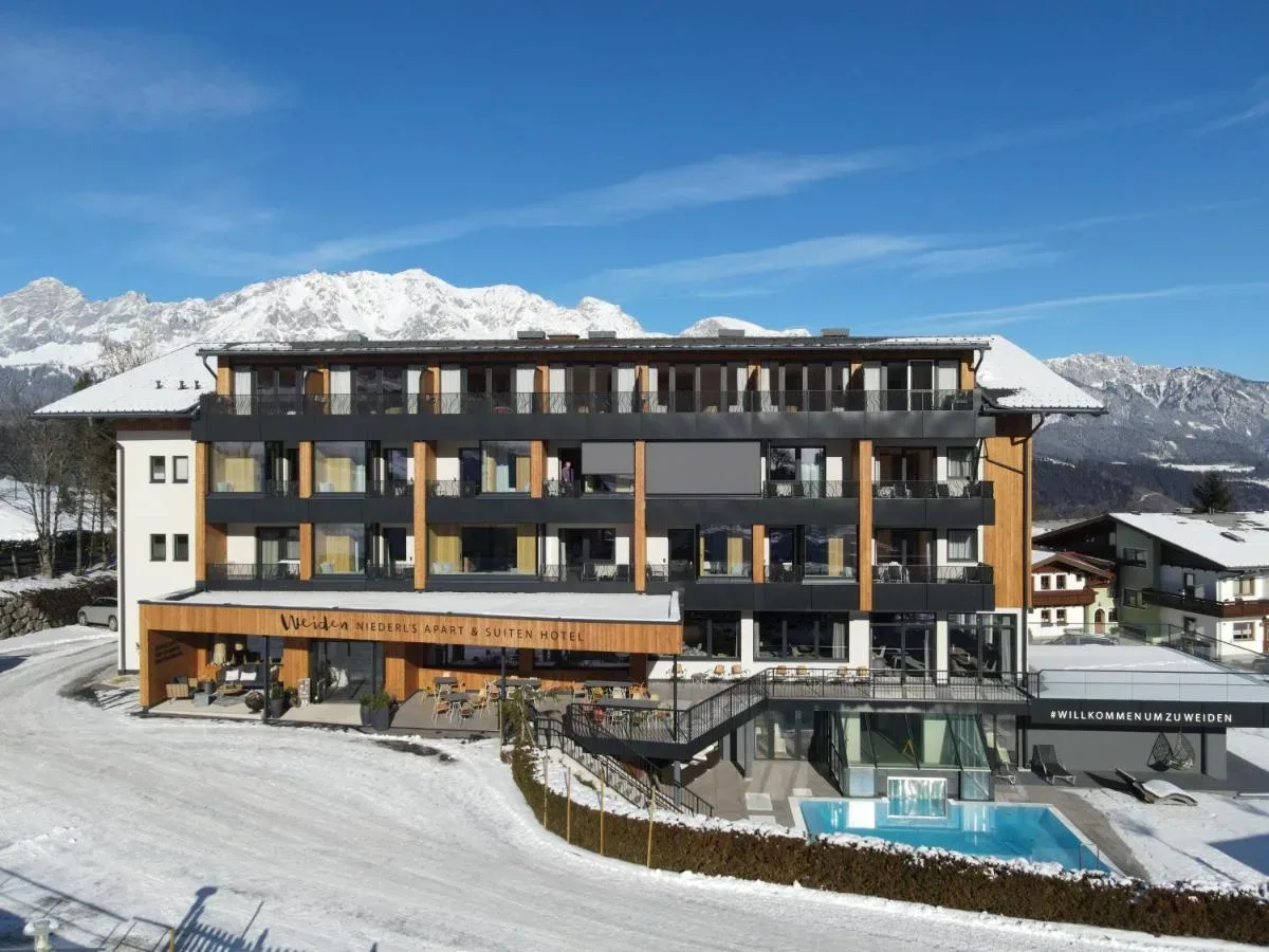 Smučarski raj in vrhunski apartmaji: Odkrijte Hotel WEIDEN v čarobnem Schladmingu!