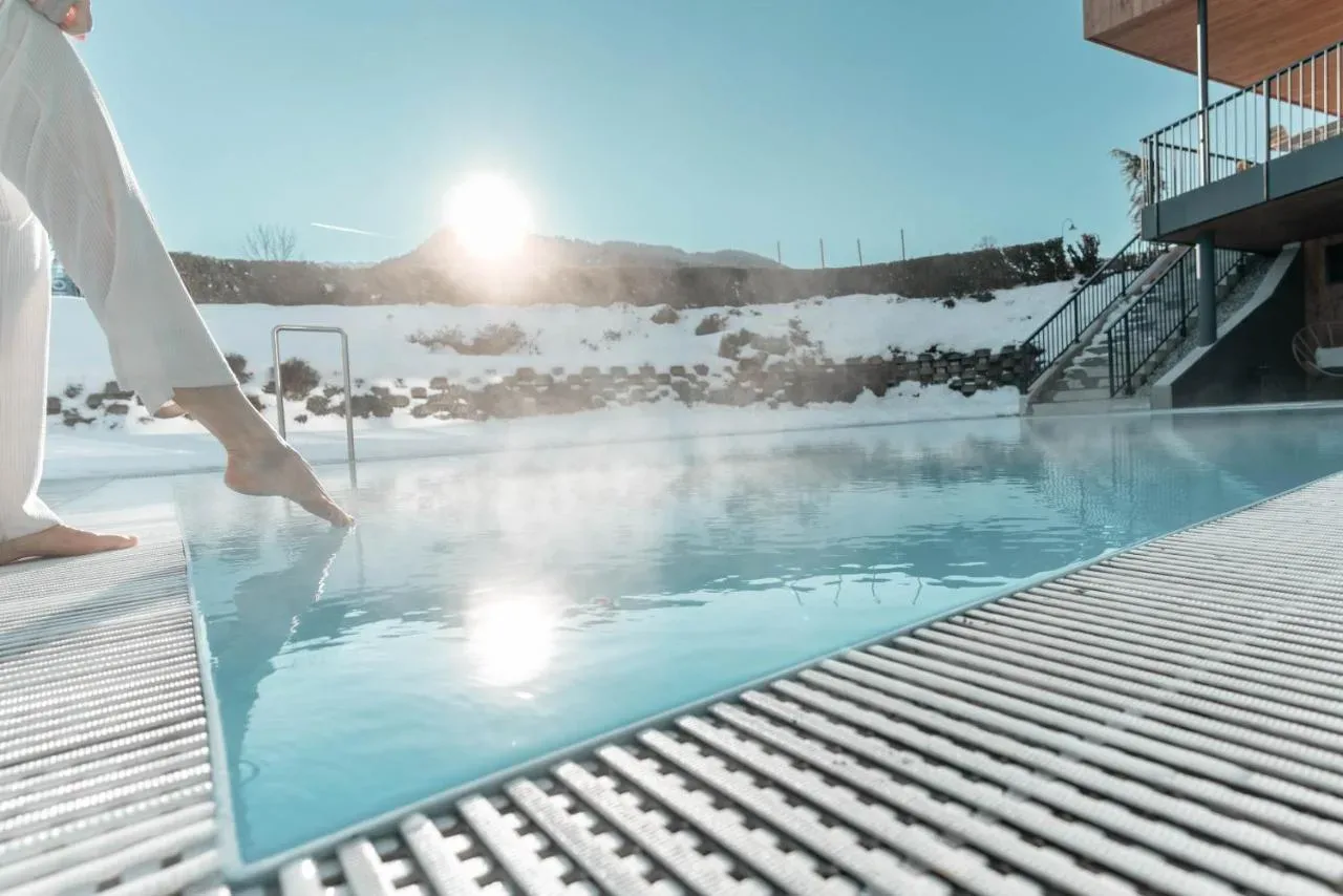 Smučarski raj in vrhunski apartmaji: Odkrijte Hotel WEIDEN v čarobnem Schladmingu!