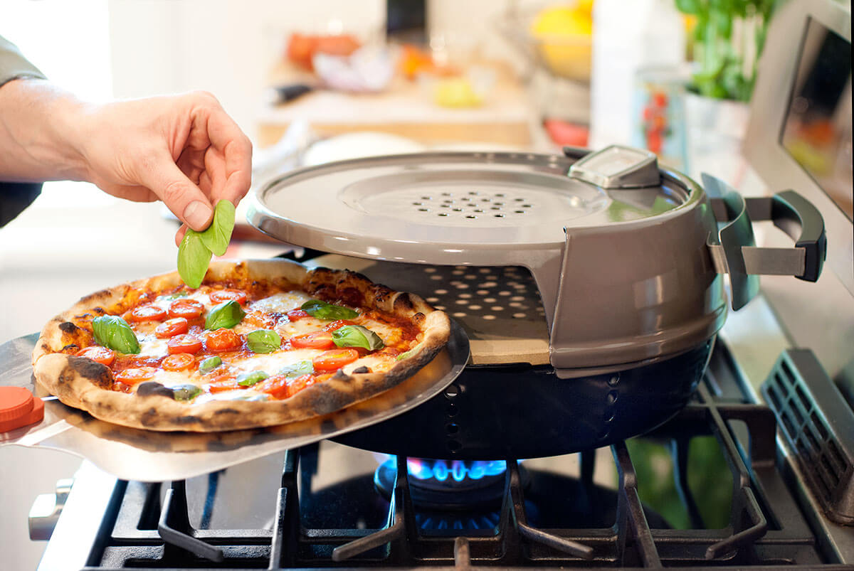 https://citymagazine.si/en/pizzeria-pronto-pizza-like-from-a-bread-oven-on-a-stove/pc0600-williams-sonoma-stovetop-pizza-oven-2/