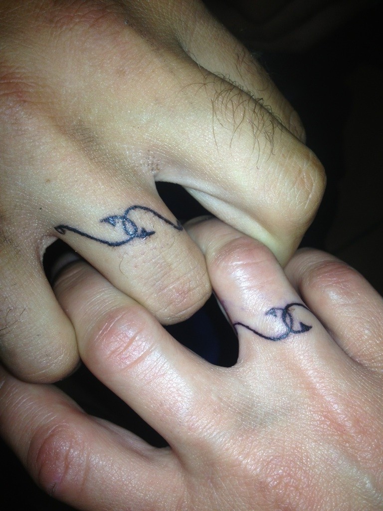 Fish hook wedding deals ring tattoo