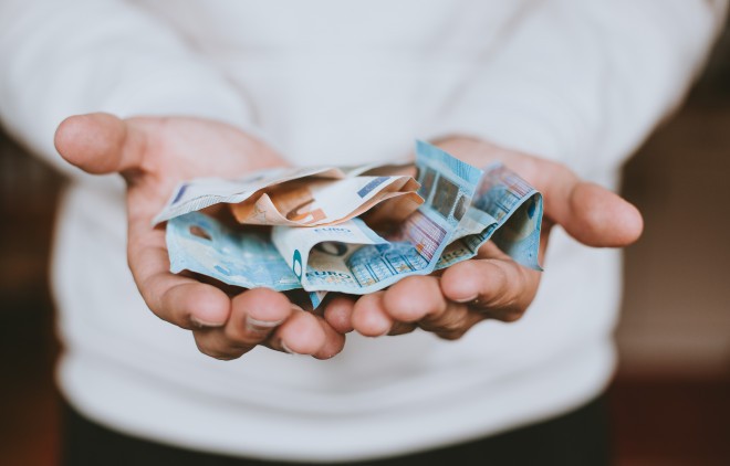 Paper money is less favorable for the virus, but still, money itself is pretty dirty